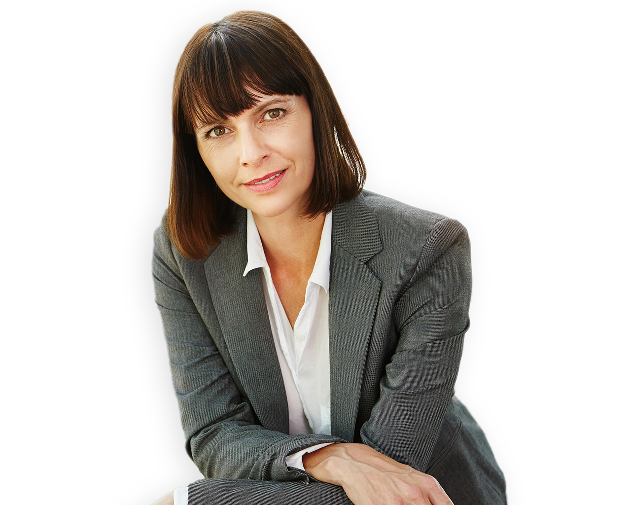Portrait of successful business woman standing with arms crossed looking confident